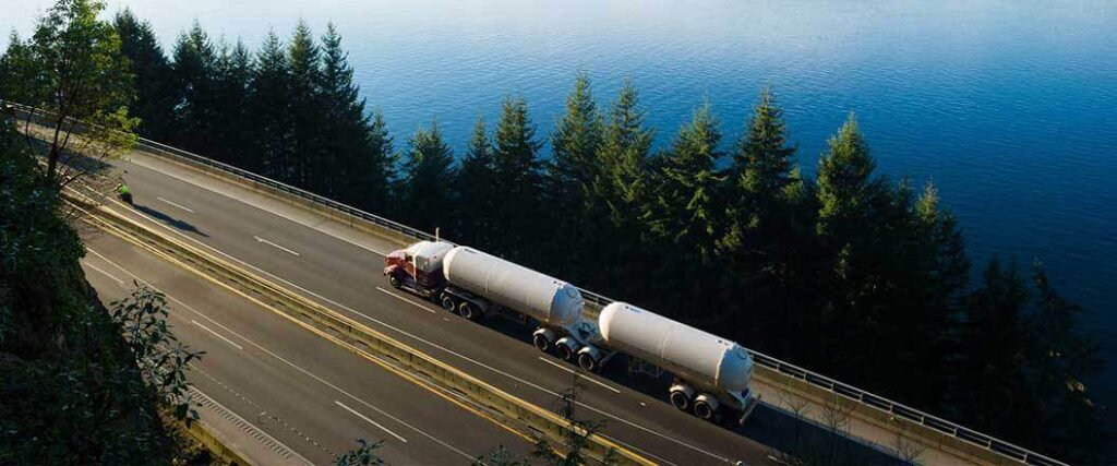 big rig hauling double tanker trailer
