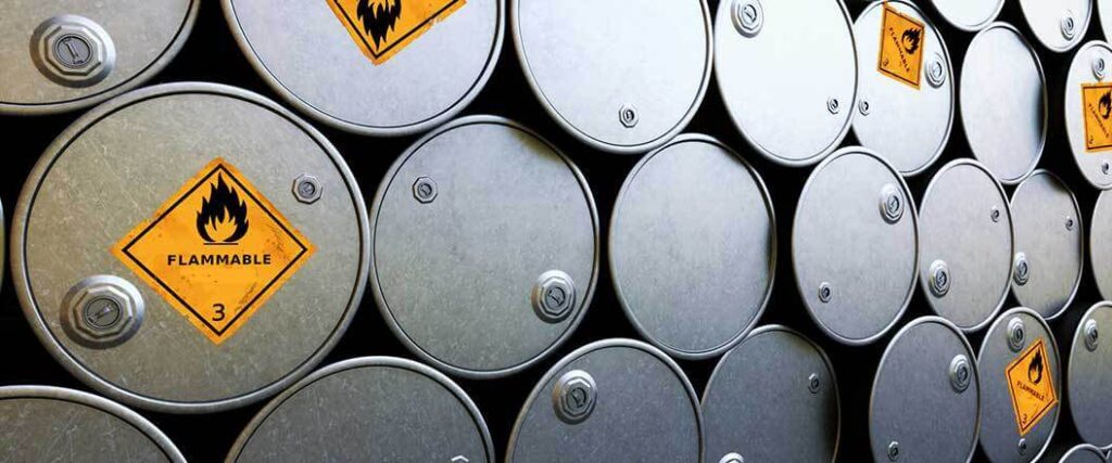 ethylene exports from the us stacked liquid container drums with flammable sticker visible